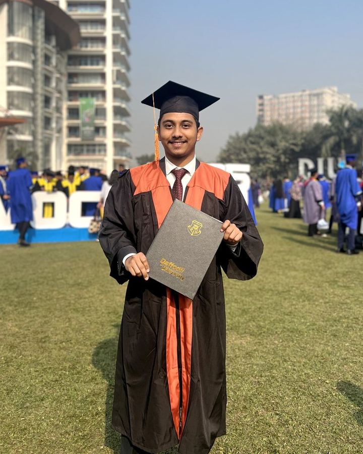 Shahparan Rimon in his graduation gown at Daffodil International University