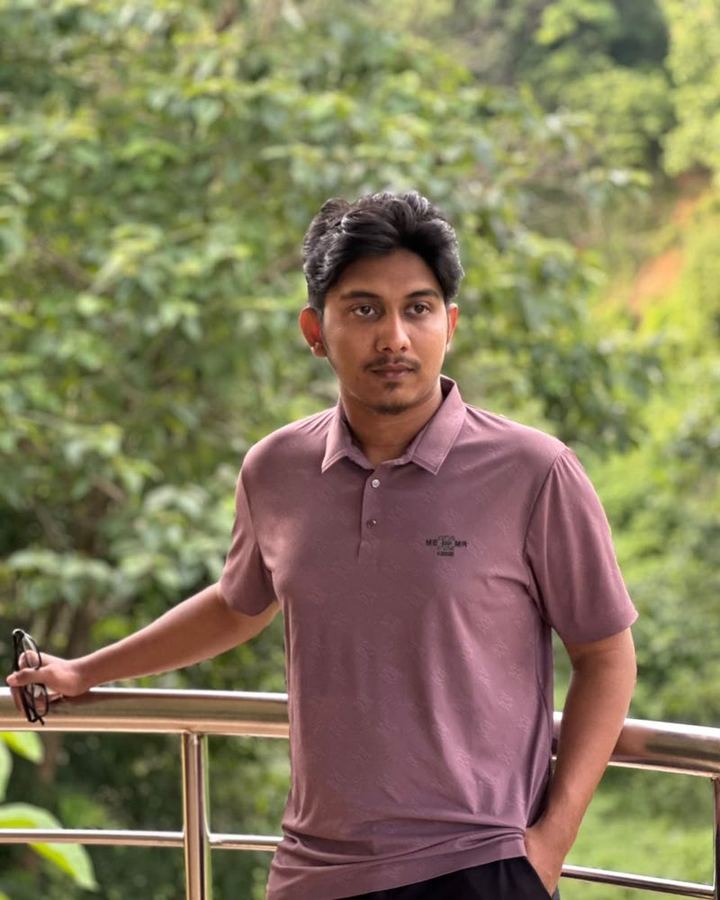 Shahparan Rimon outdoors by a railing